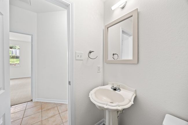 Half bath off the family room. | Image 21