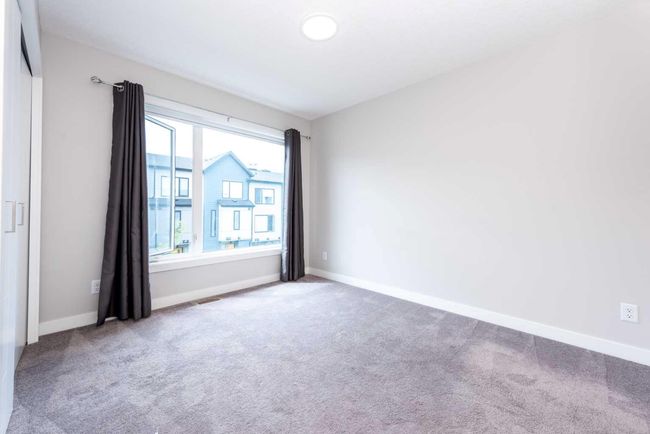 213 Evanscrest Sq Nw, Townhouse with 2 bedrooms, 3 bathrooms and 2 parking in Calgary AB | Image 32
