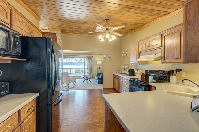 Cook with a view! Enjoy spacious kitchen counters and cabinets while taking in the stunning river scenery. | Image 10