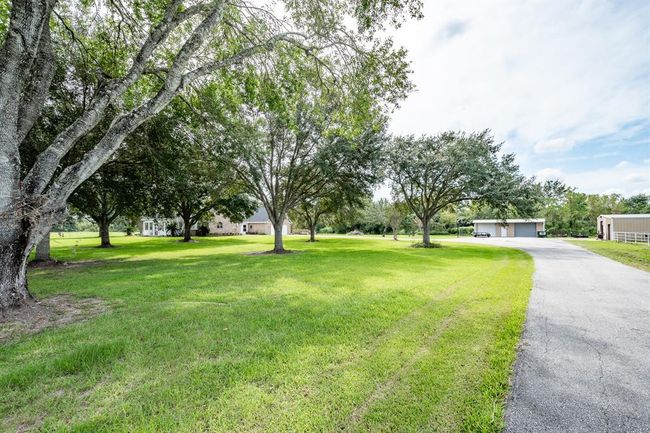 402 Cs Harmon Rd, Home with 4 bedrooms, 4 bathrooms and 2 parking in Hankamer TX | Image 40