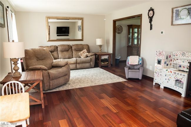Living area featuring wood finished floors | Image 15