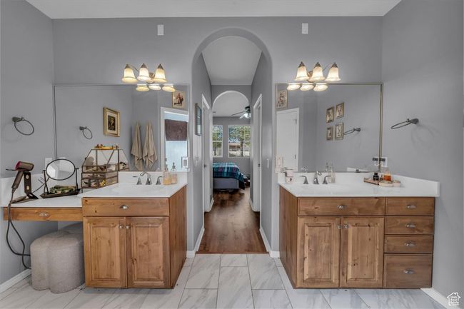 Ensuite bathroom with marble finish floor, two vanities, a sink, and ensuite bathroom | Image 21