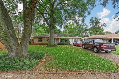 Single story home with a front lawn | Image 1