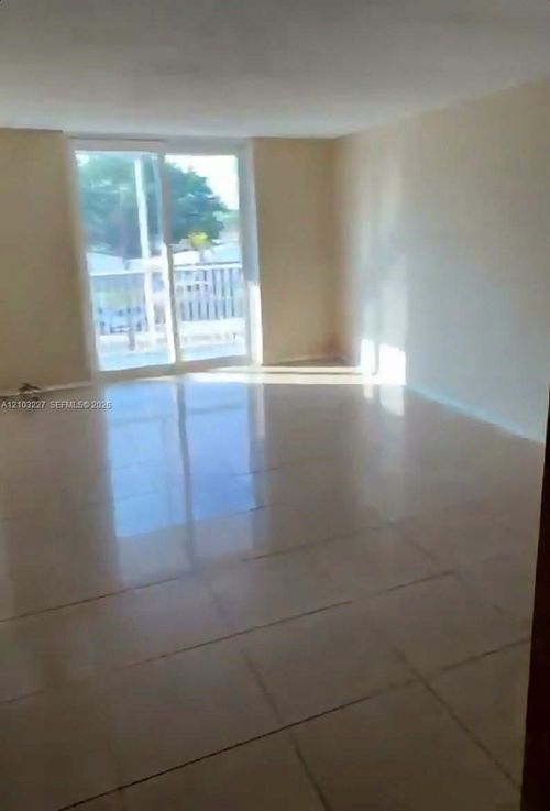 a311-16851 Ne 23rd Ave, North Miami Beach, FL, 33160 | Card Image
