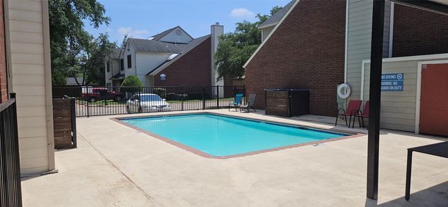 Community pool featuring a patio area | Image 4