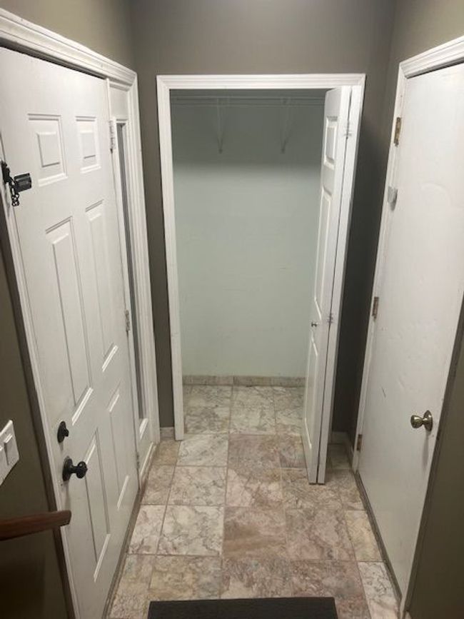 FOYER: (L) DR TO FRONT, (R) DR TO GARAGE & CLOSET | Image 7