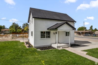 View of front of home with a front lawn | Image 1