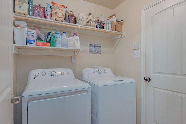 Laundry room with laundry area and separate washer and dryer | Image 13