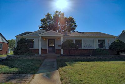 View of front of house featuring a front lawn | Image 1