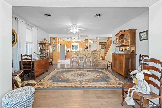Dining room looking into the kitchen/bar area | Image 12