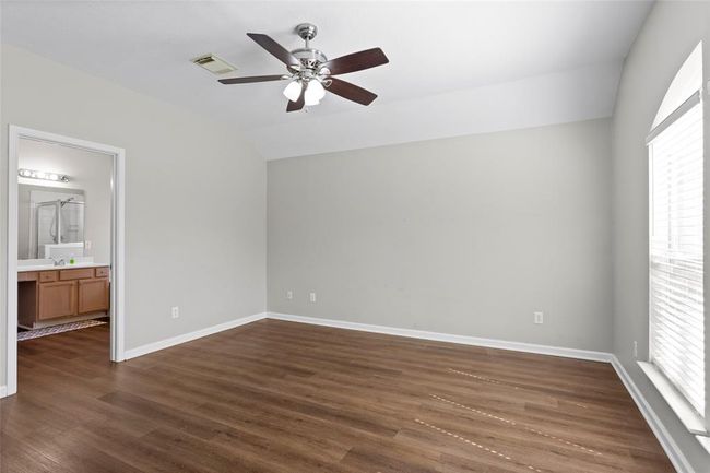 The Primary Bedroom | Image 10