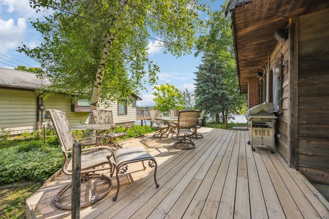 Close up of the deck and view of the lake. | Image 12