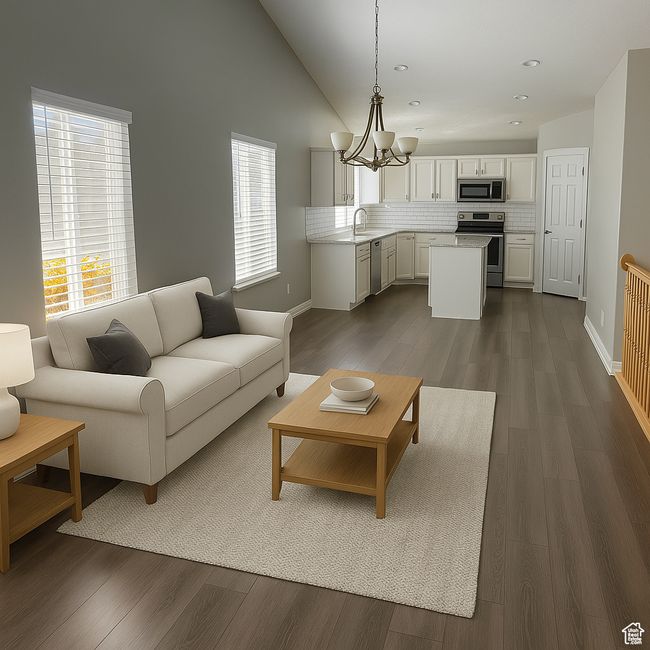 Living area with a chandelier, baseboards, dark wood-type flooring, vaulted ceiling, and recessed lighting | Image 5
