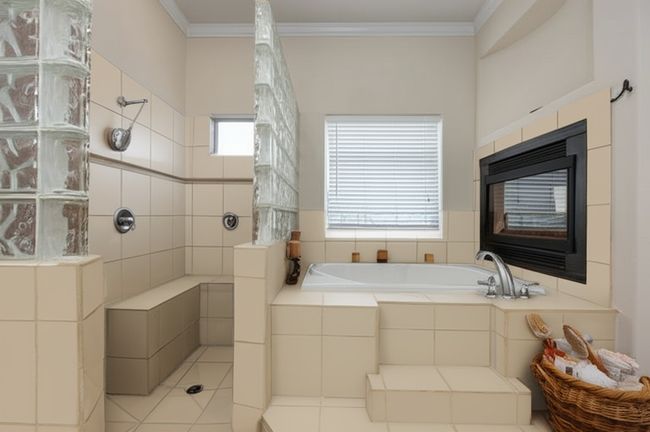 Virtual photo showing all tile resurfaced in a light color | Image 15