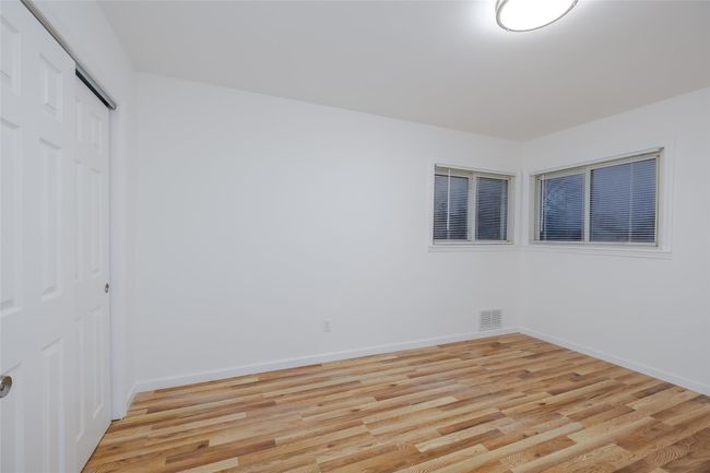 bedroom with light hardwood / wood-style floors | Image 24