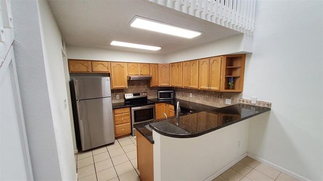 APT-228 - 2611 Grants Lake Blvd, Townhouse with 2 bedrooms, 1 bathrooms and 1 parking in Sugar Land TX | Image 8