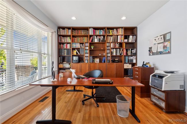 Home office/flex space at the front of the home. Recessed lighting and excellent views to the exterior. | Image 24