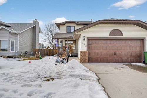 592 Meadowbrook Bay Se, Airdrie, AB, T4A2A9 | Card Image