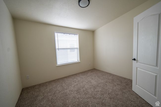 Unfurnished room featuring carpet | Image 15