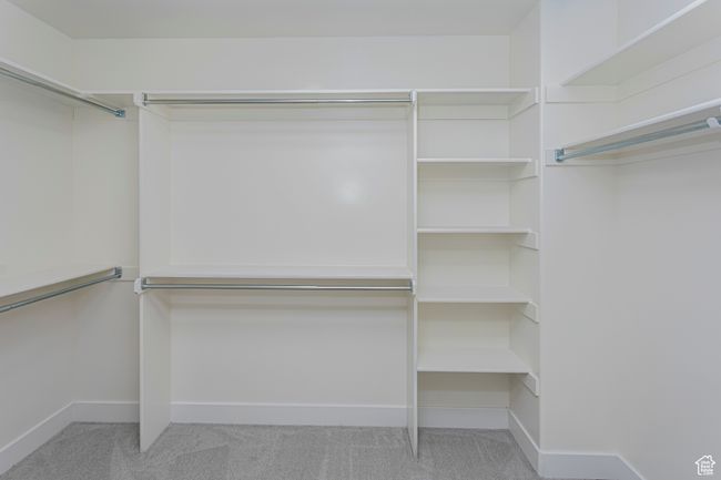 Walk in closet featuring carpet floors | Image 20