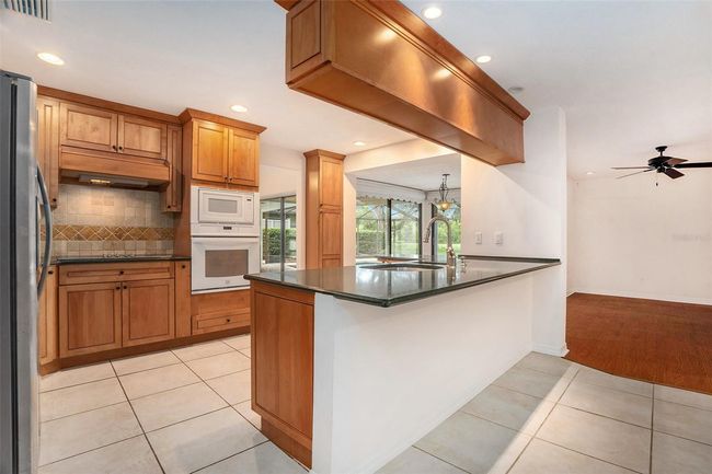 13310 Golf Crest Cir, House other with 6 bedrooms, 3 bathrooms and null parking in TAMPA FL | Image 12