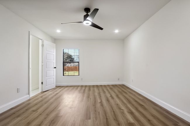 Unfurnished bedroom with light wood-style floors, recessed lighting, baseboards, and a ceiling fan | Image 15