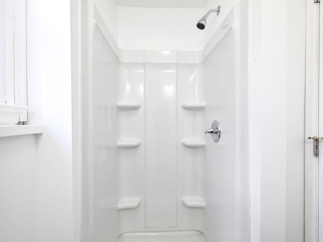Bathroom featuring walk in shower | Image 22