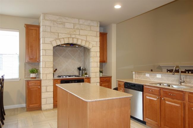Spacious Kitchen with center island and plenty of counter space. | Image 5