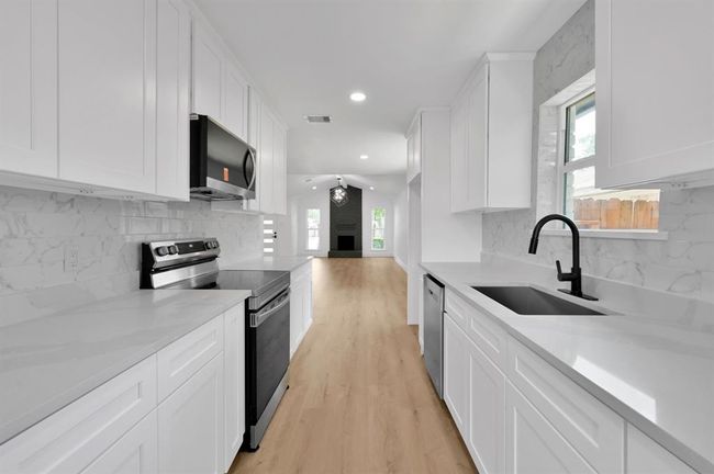 5015 Monteith Dr, House other with 3 bedrooms, 2 bathrooms and 2 parking in Spring TX | Image 9