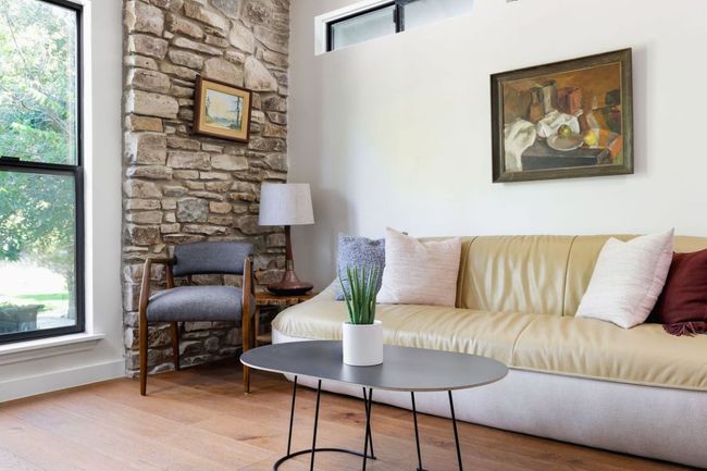 Living area with wood finished floors | Image 19