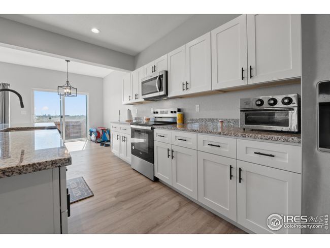 444 Molly Ln, Townhouse with 3 bedrooms, 3 bathrooms and null parking in Fort Morgan CO | Image 15