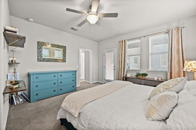 With ample space, natural light, and a soothing atmosphere, this primary suite is the perfect place to unwind and recharge after a busy day. | Image 16