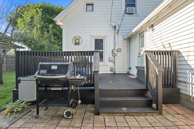 wooden deck featuring a grill | Image 52