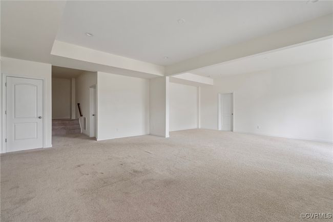 Empty room featuring light colored carpet and baseboards | Image 37