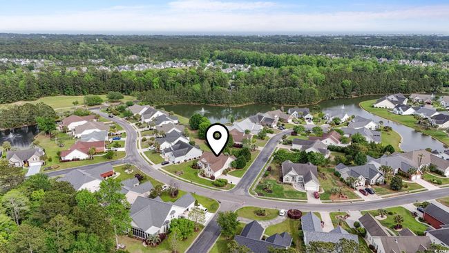 Aerial view featuring a forest view, a water view, and a residential view | Image 27