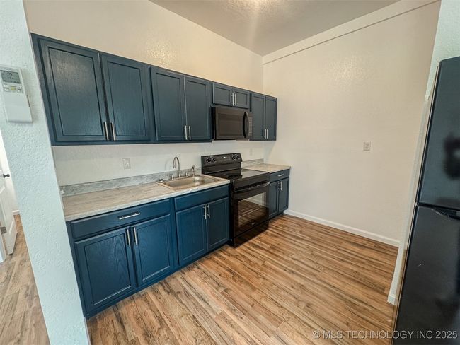916 Coy Ave, Home with 3 bedrooms, 2 bathrooms and null parking in Tahlequah OK | Image 11