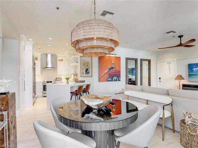 Dining area with ceiling fan | Image 18