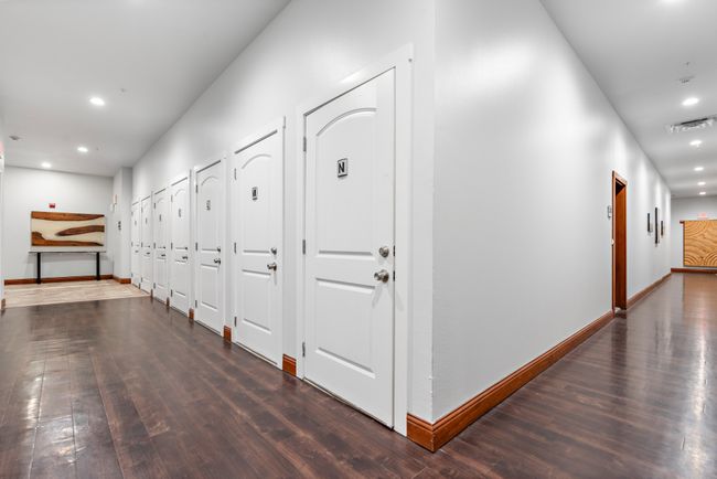 Corridor featuring wood finished floors, recessed lighting, and baseboards | Image 19
