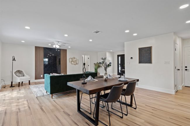 Dining area with recessed lighting, light wood finished floors, baseboards, and ceiling fan | Image 12