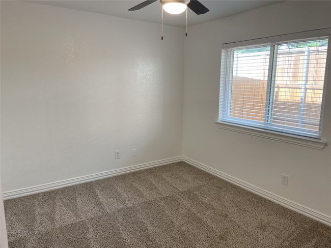 Spare room featuring carpet flooring and a ceiling fan | Image 14