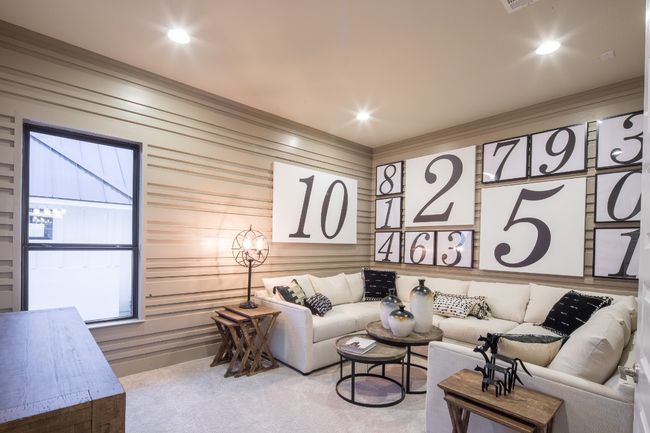 Carpeted living room with crown molding and recessed lighting | Image 23