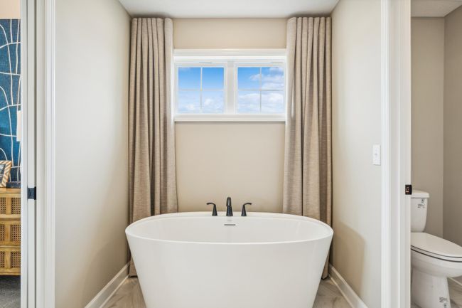 Photo is of the actual model. The soaking tub. | Image 16
