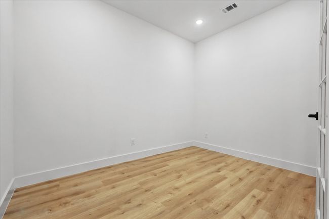 Unfurnished room featuring baseboards, light wood-style flooring, and recessed lighting | Image 7