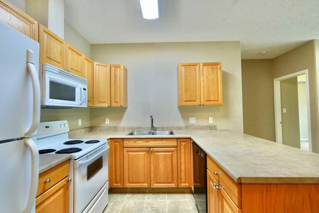 404 - 9810 94 St, Condo with 2 bedrooms, 2 bathrooms and 1 parking in Peace River AB | Image 26