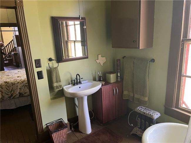 Bathroom and wood finished floors | Image 23