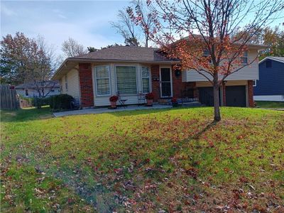 Split level home with a garage | Image 2