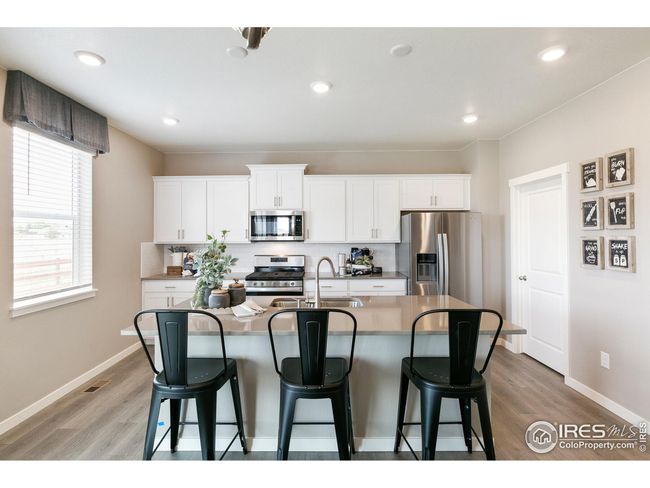 6015 Holstein Dr, House other with 4 bedrooms, 3 bathrooms and null parking in Windsor CO | Image 6