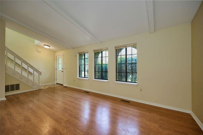 Entryway with stairway and wood finished floors | Image 5