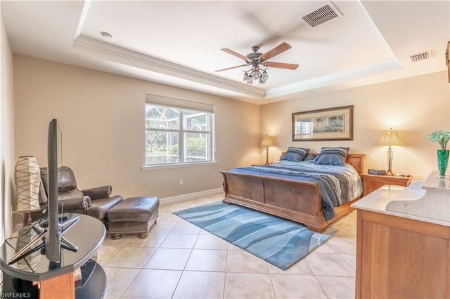 Sunroom with a wealth of natural light and ceiling fan | Image 30