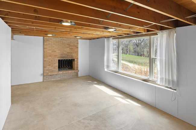 The lower level boasts of light and is partially finished for you! | Image 23